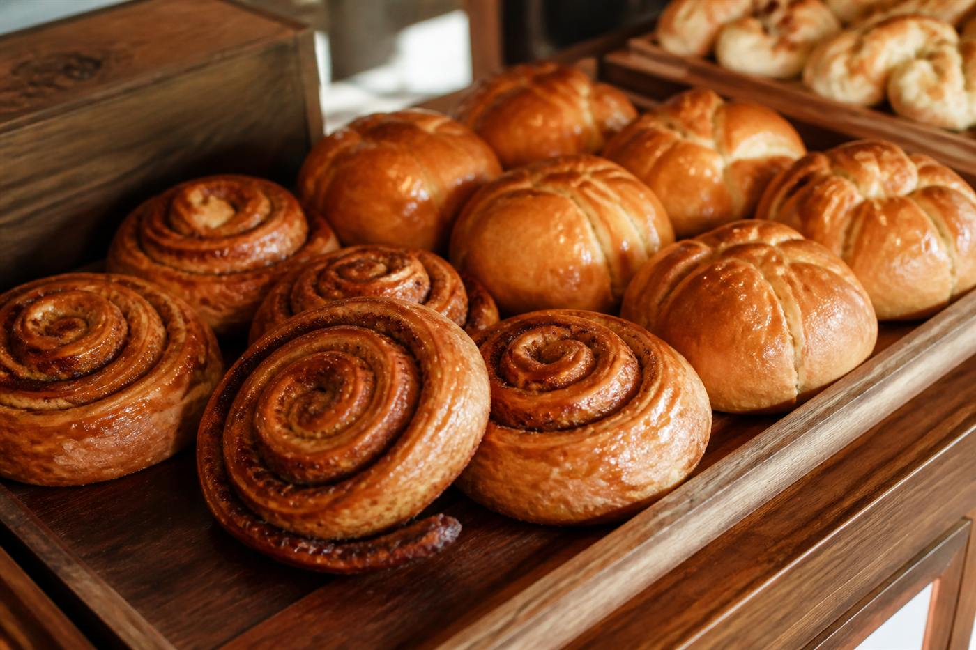 Pastries arranged on a bakery counter